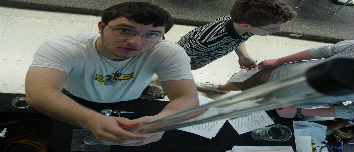 Mike makes a meaurement of the volume change.